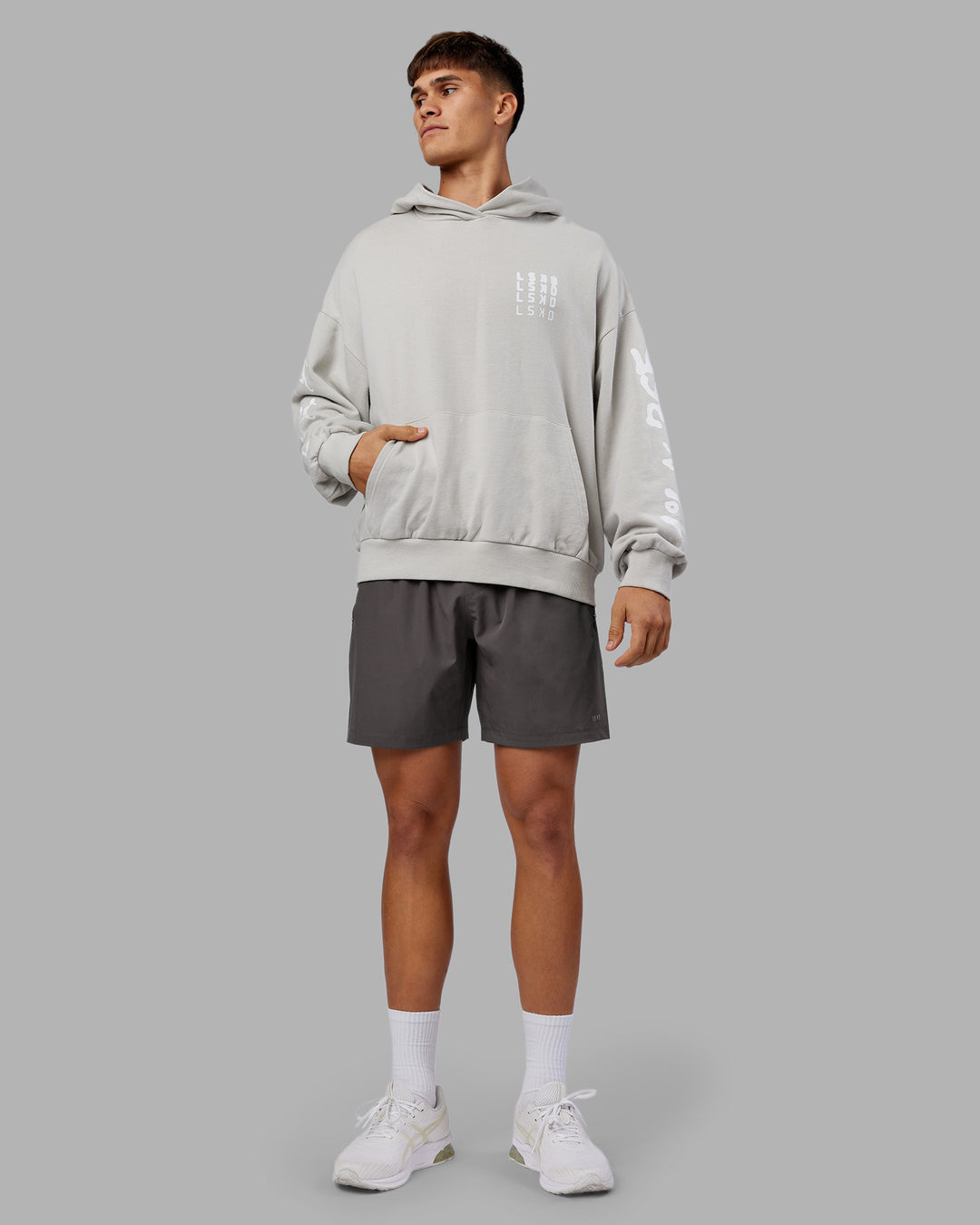 Man wearing Journey Washed Unisex Oversize Hoodie - Digital Mist-White | Model:Jackson | Size:L