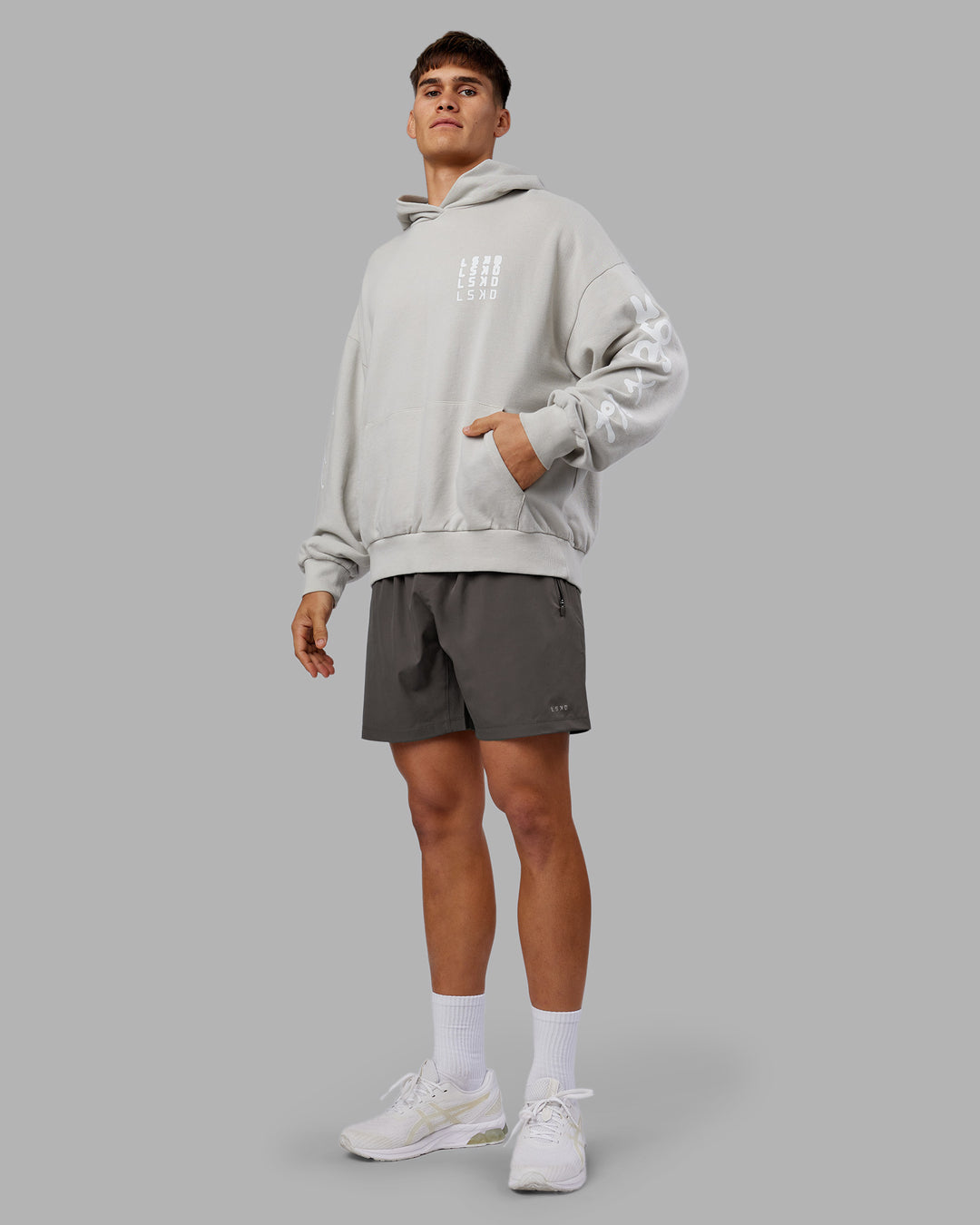 Man wearing Journey Washed Unisex Oversize Hoodie - Digital Mist-White | Model:Jackson | Size:L