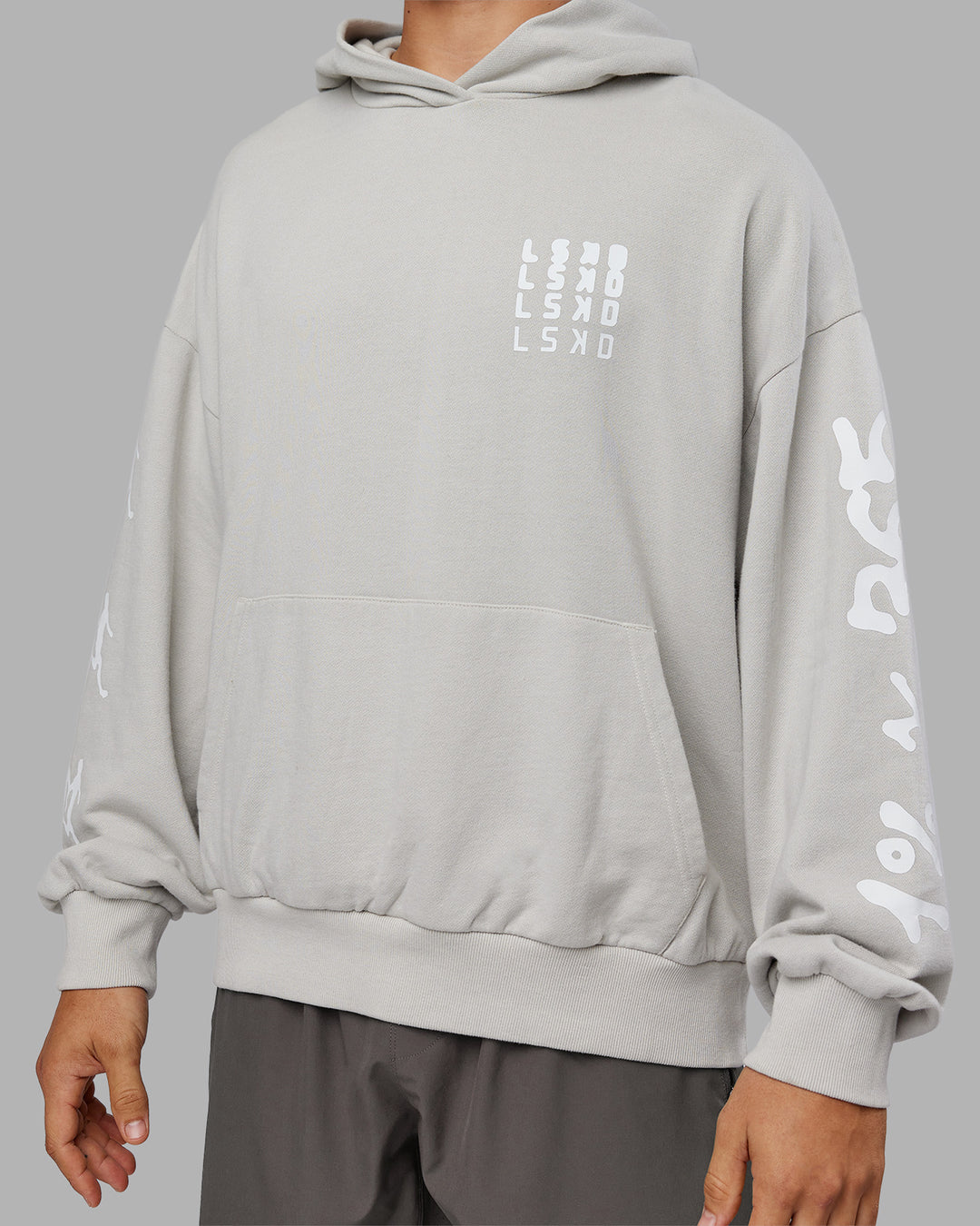 Man wearing Journey Washed Unisex Oversize Hoodie - Digital Mist-White | Model:Jackson | Size:L