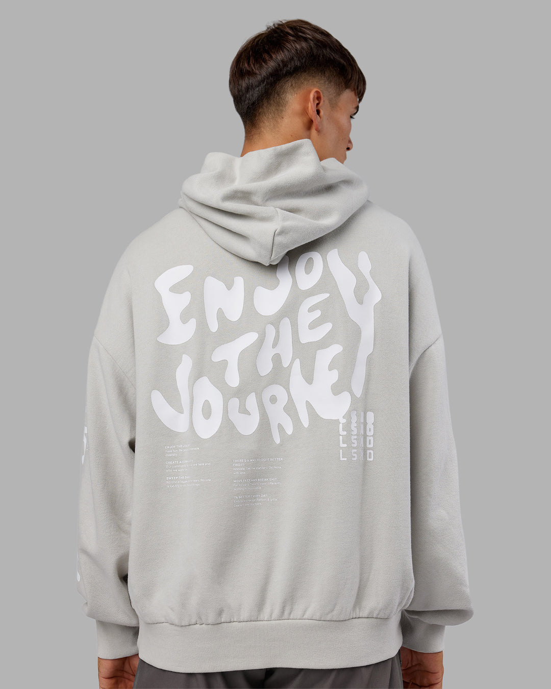 Man wearing Journey Washed Unisex Oversize Hoodie - Digital Mist-White | Model:Jackson | Size:L