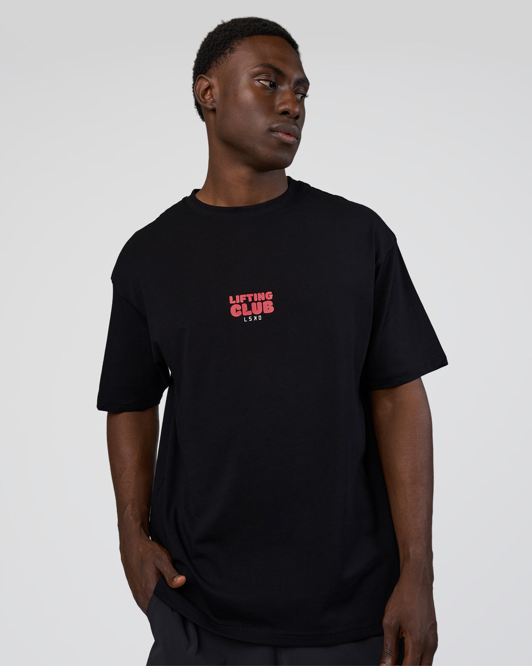 Man wearing Kettle B FLXCotton Oversized Tee - Black-White | Model:Paabio | Size:L