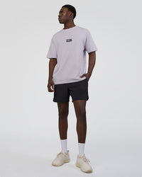 Man wearing Kettle B FLXCotton Oversized Tee - Galactic Lilac-Black | Model:Paabio | Size:L