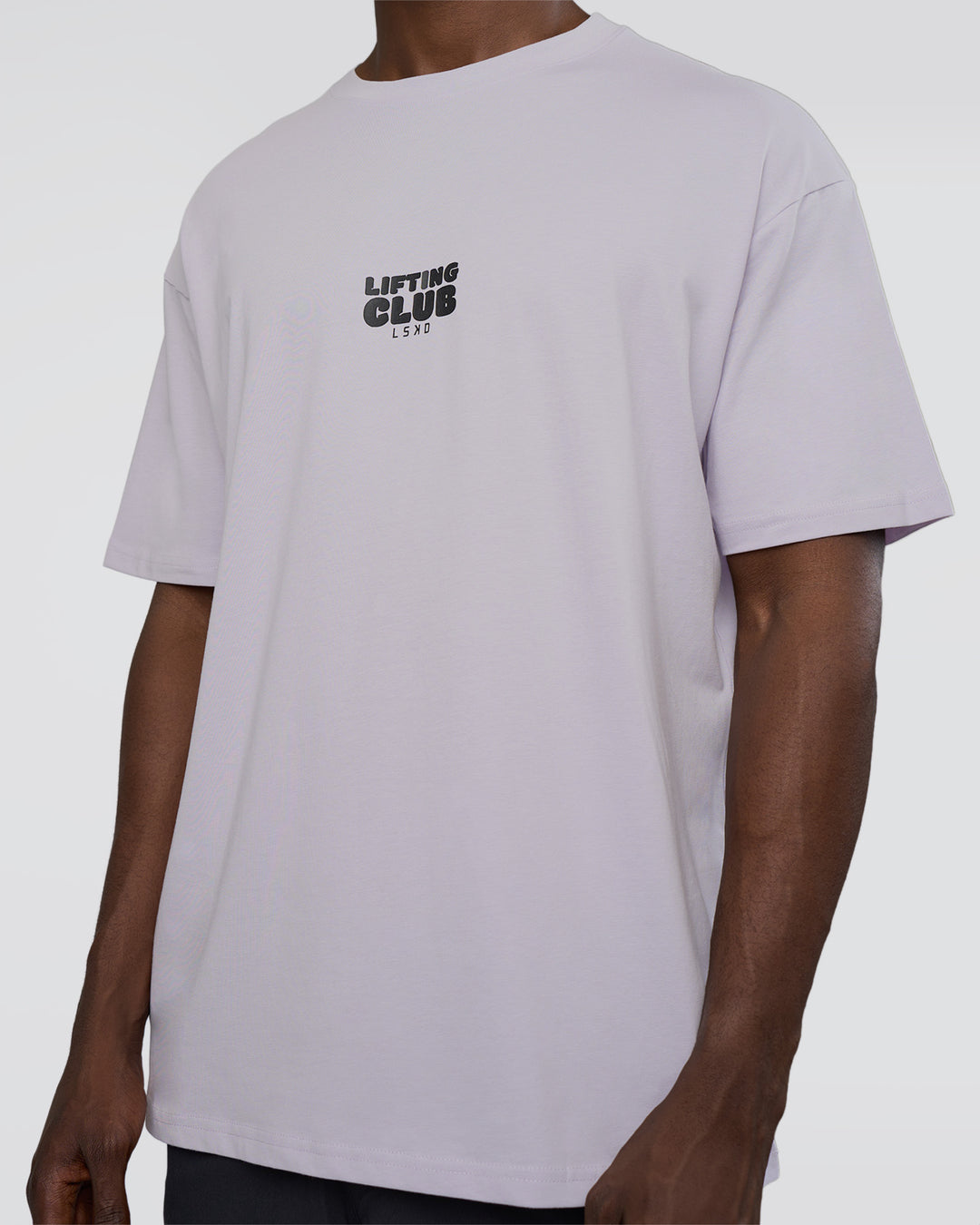 Man wearing Kettle B FLXCotton Oversized Tee - Galactic Lilac-Black | Model:Paabio | Size:L