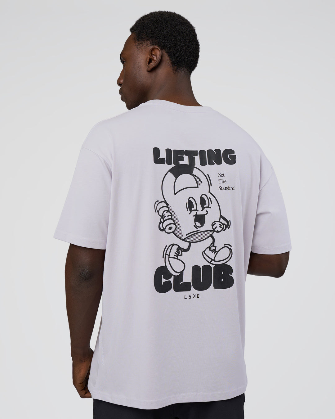 Man wearing Kettle B FLXCotton Oversized Tee - Galactic Lilac-Black | Model:Paabio | Size:L