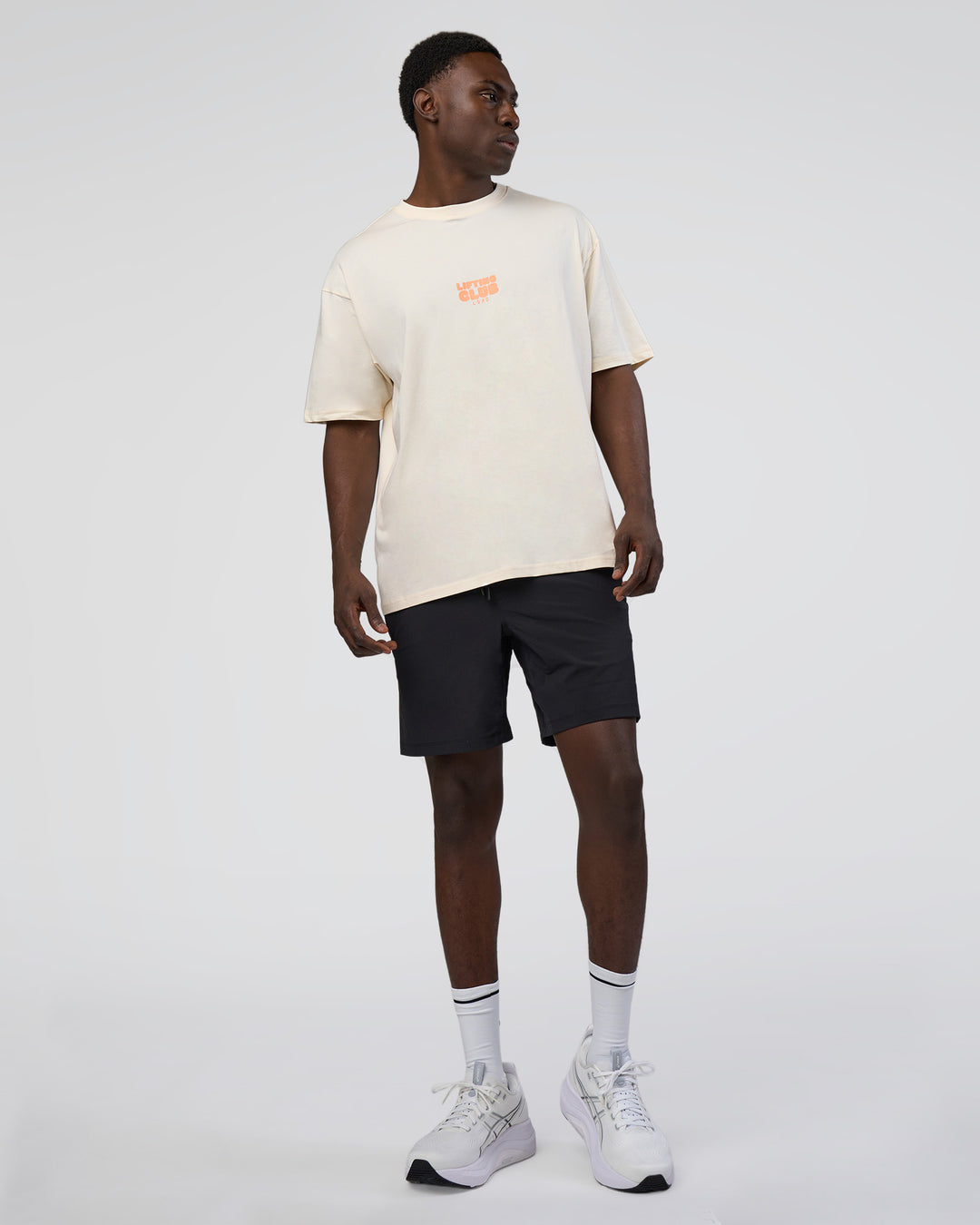 Man wearing Kettle B FLXCotton Oversized Tee - Sugar Swizzle-Cantaloupe | Model:Paabio | Size:L