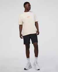 Man wearing Kettle B FLXCotton Oversized Tee - Sugar Swizzle-Cantaloupe | Model:Paabio | Size:L