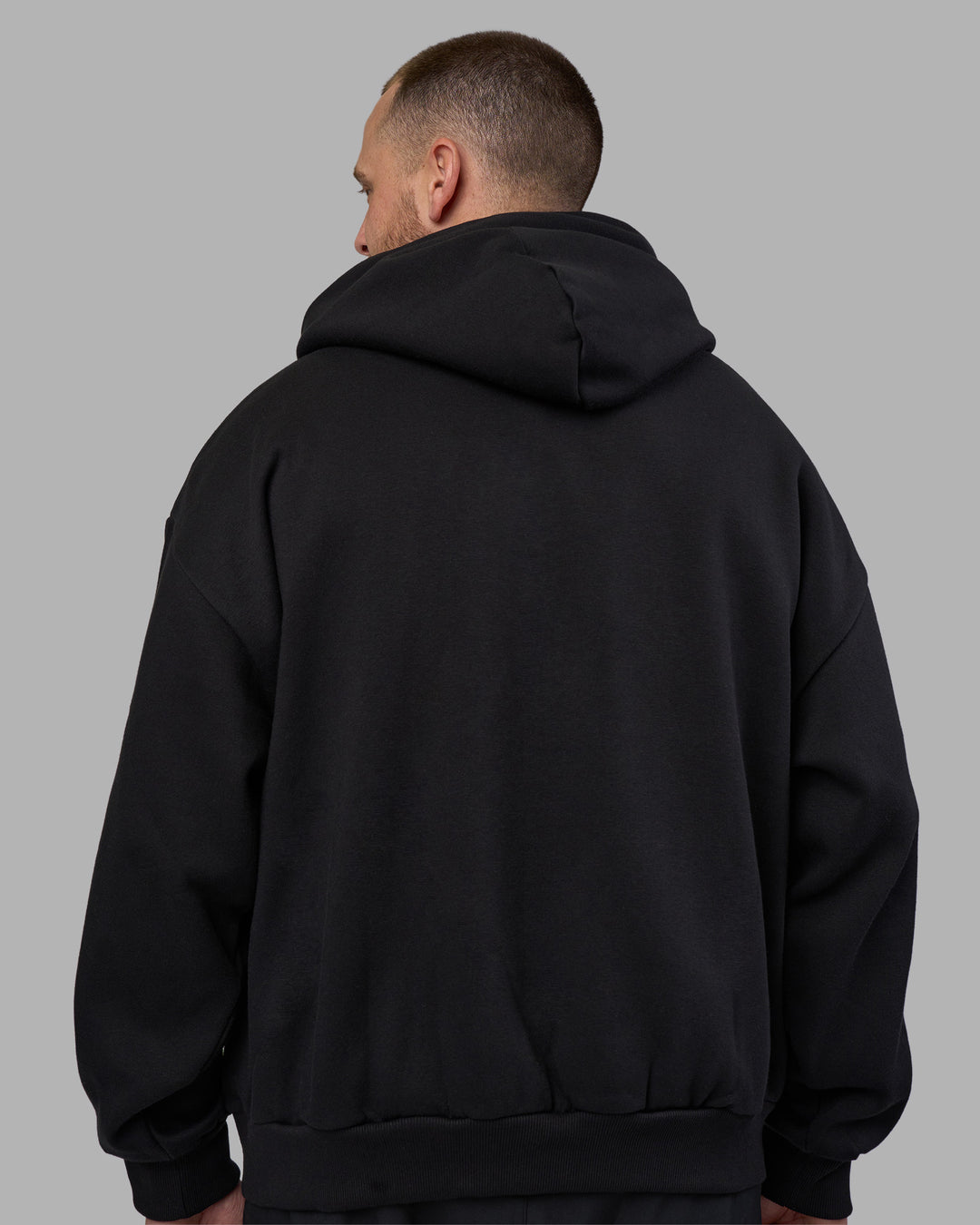 Man wearing LSKD TRD Hoodie - Black | Model:Macca | Size:L