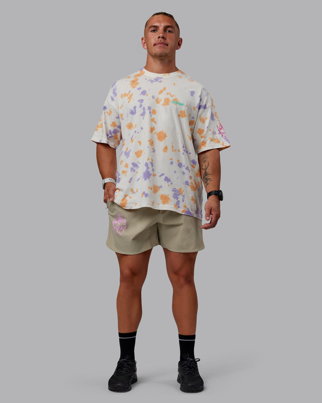 Man wearing Lift 6" Performance Shorts - Sand-So Cal 24