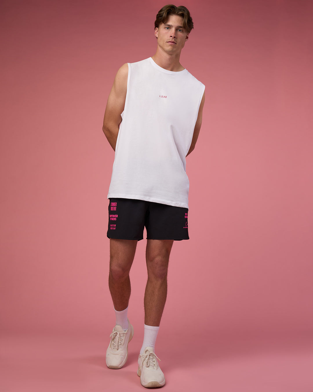 Man wearing Lift 6&quot; Short - Black-Ultra Pink | Model:Brandon | Size:L
