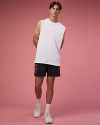 Man wearing Lift 6" Short - Black-Ultra Pink | Model:Brandon | Size:L