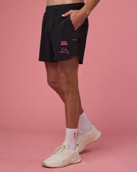 Man wearing Lift 6" Short - Black-Ultra Pink | Model:Brandon | Size:L