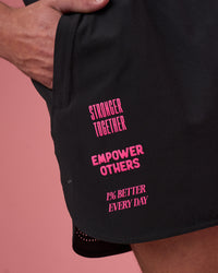Man wearing Lift 6" Short - Black-Ultra Pink | Model:Brandon | Size:L