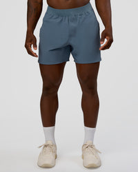Man wearing Lift 6" Short - Blue Mirage | Model:Sam | Size:L