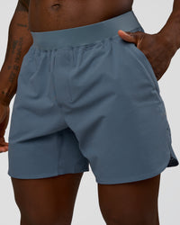 Man wearing Lift 6" Short - Blue Mirage | Model:Sam | Size:L