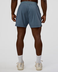 Man wearing Lift 6" Short - Blue Mirage | Model:Sam | Size:L