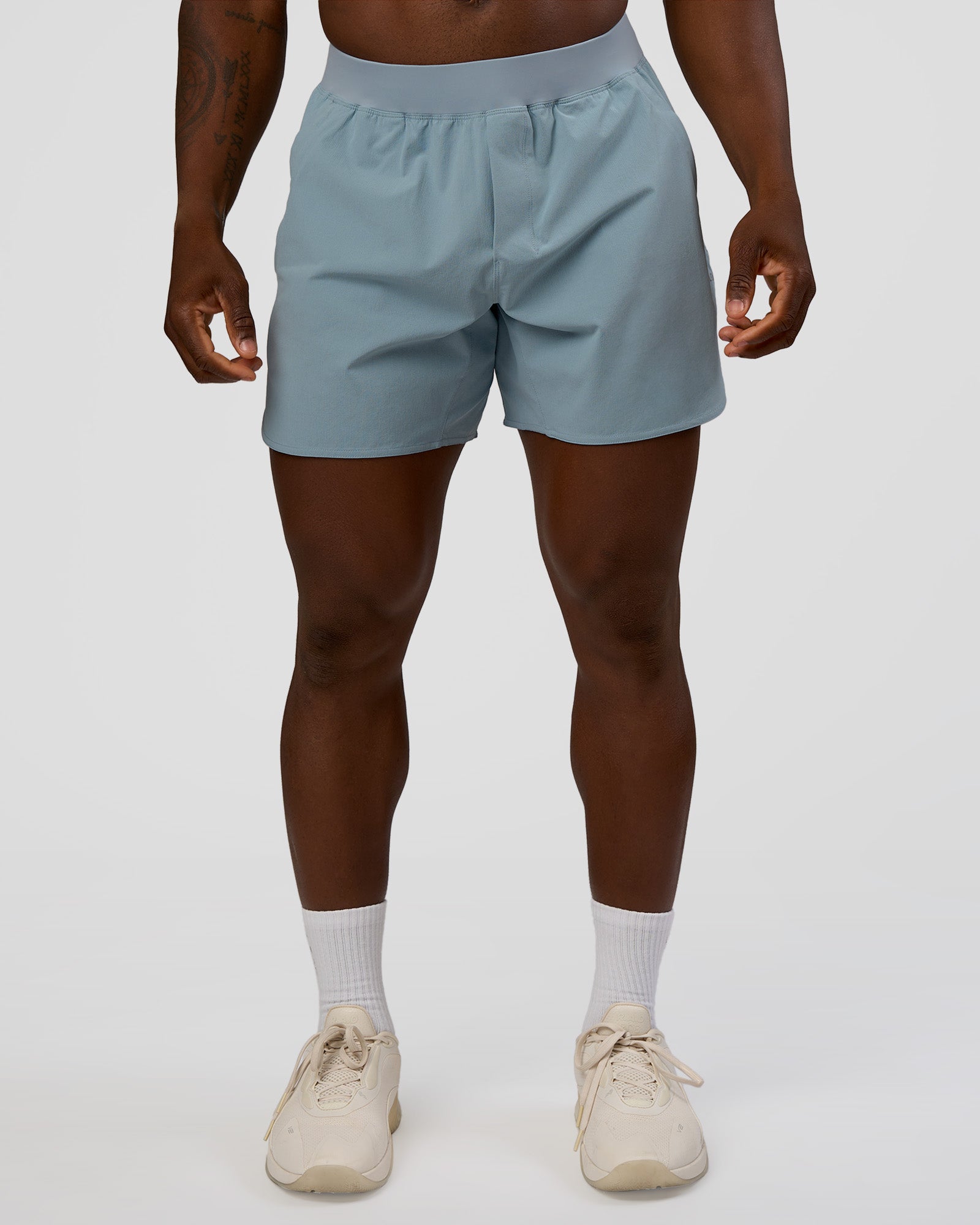 Man wearing Lift 6" Short - Dusty Blue | Model:Sam | Size:L