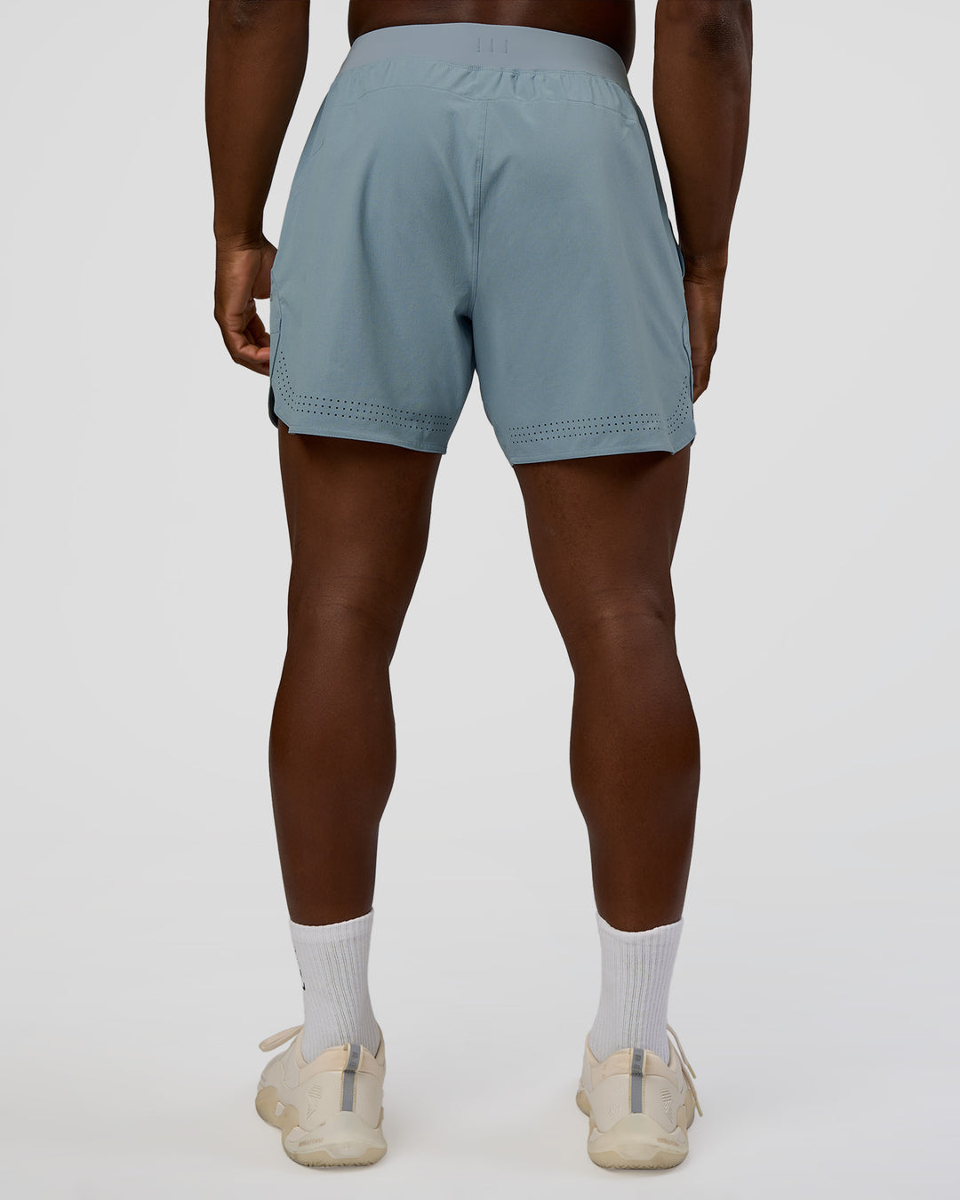 Man wearing Lift 6" Short - Dusty Blue | Model:Sam | Size:L