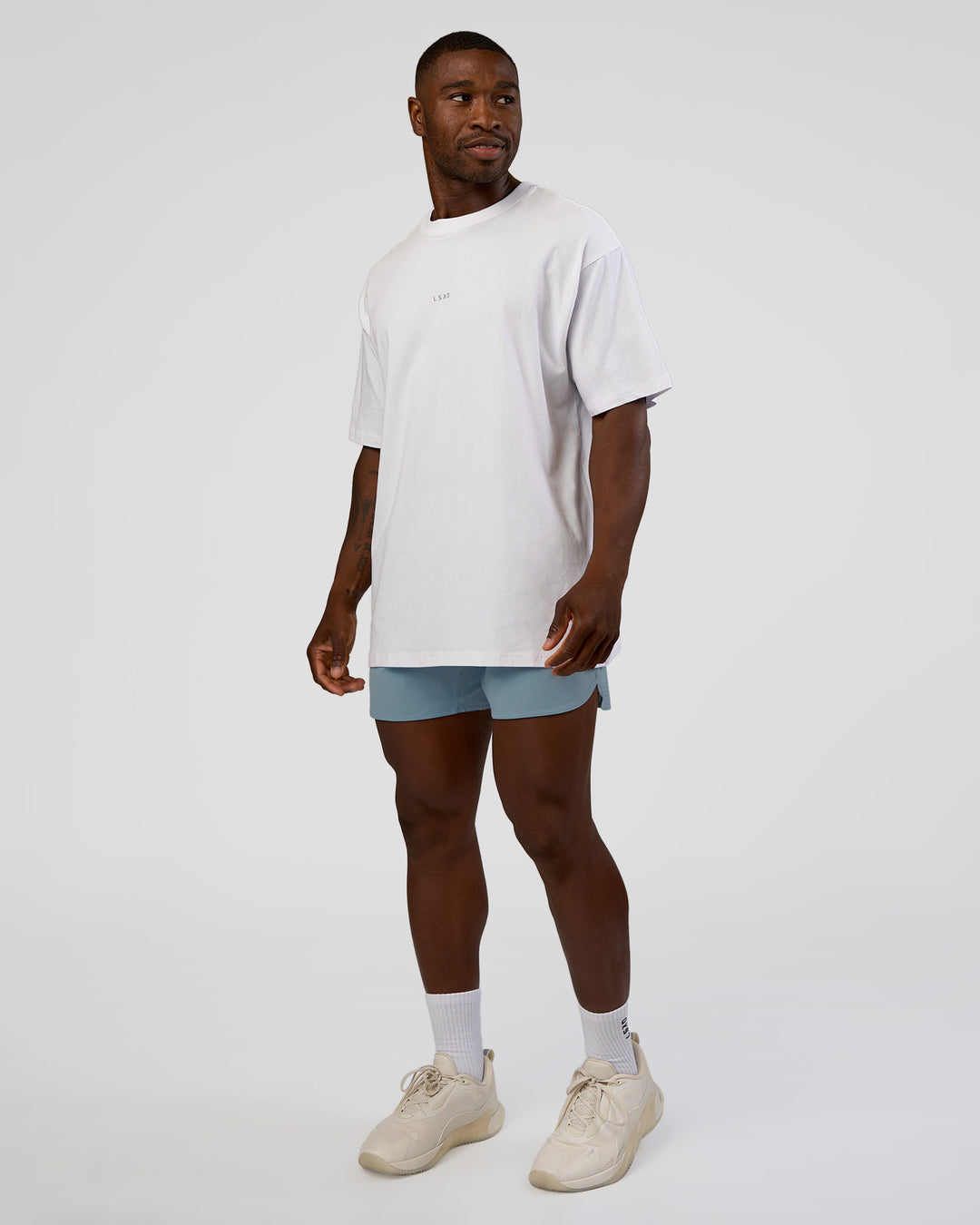 Man wearing Lift 6" Short - Dusty Blue | Model:Sam | Size:L