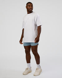 Man wearing Lift 6" Short - Dusty Blue | Model:Sam | Size:L
