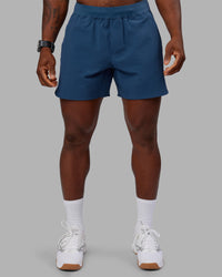 Man wearing Lift 6" Short - Indigo | Model:Sam | Size:L
