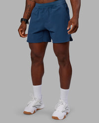 Man wearing Lift 6" Short - Indigo | Model:Sam | Size:L