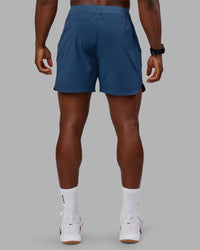 Man wearing Lift 6" Short - Indigo | Model:Sam | Size:L
