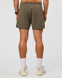 Man wearing Lift 6" Short - Walnut Grey | Model:Liam | Size:L