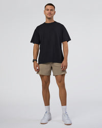 Man wearing Lifting Club FLXCotton Tee Oversize - Black-Black | Model:Nikola | Size:L