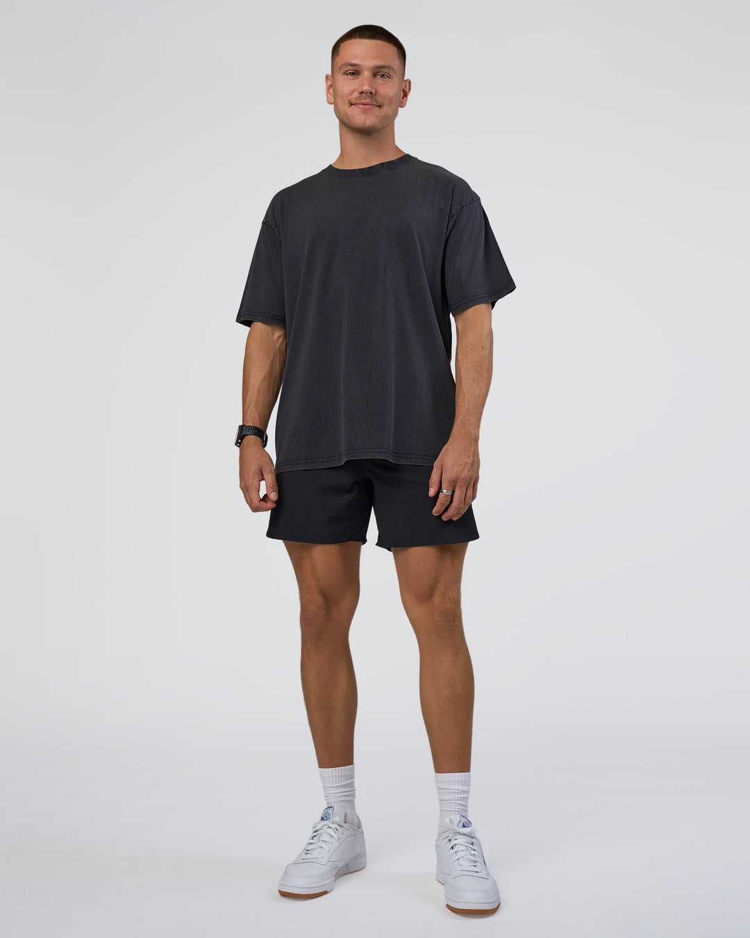 Man wearing Lifting Club FLXCotton Tee Oversize - Black Washed | Model:Nikola | Size:L