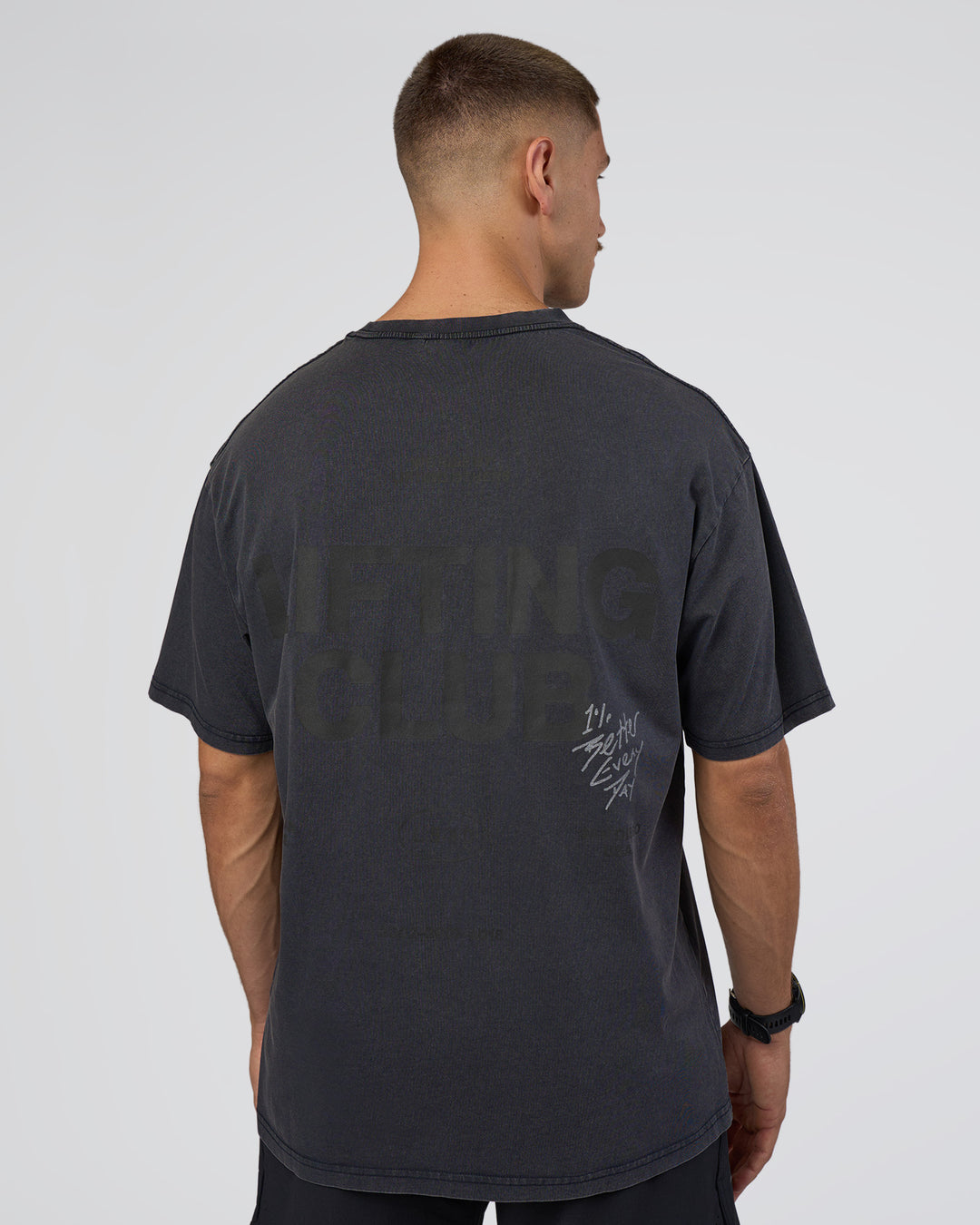 Man wearing Lifting Club FLXCotton Tee Oversize - Black Washed | Model:Nikola | Size:L