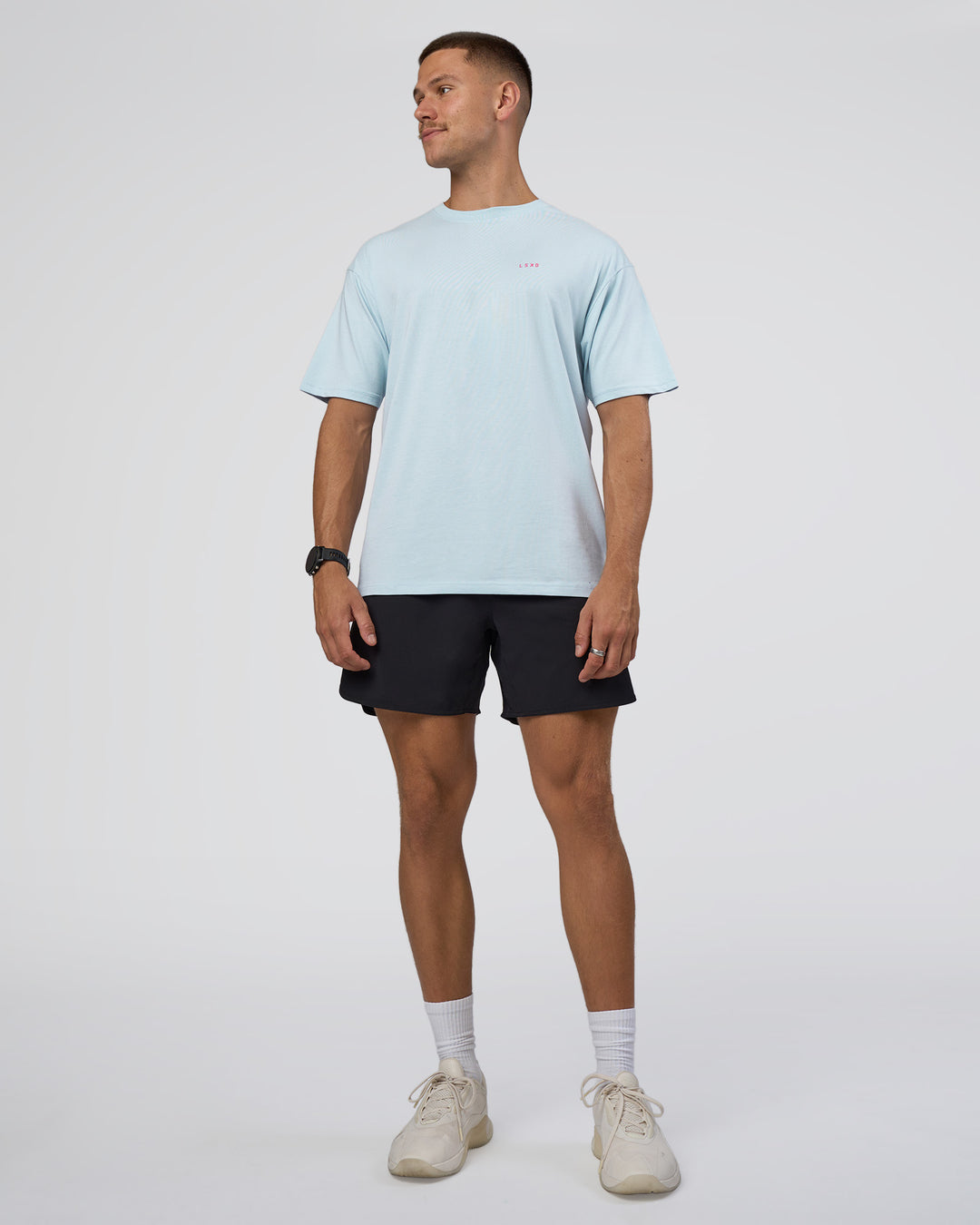 Man wearing Lifting FLXCotton Oversized Tee - Blue Aura-Ultra Pink | Model:Nikola | Size:L