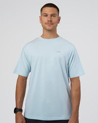 Man wearing Lifting FLXCotton Oversized Tee - Blue Aura-Ultra Pink | Model:Nikola | Size:L