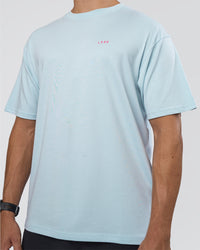 Man wearing Lifting FLXCotton Oversized Tee - Blue Aura-Ultra Pink | Model:Nikola | Size:L