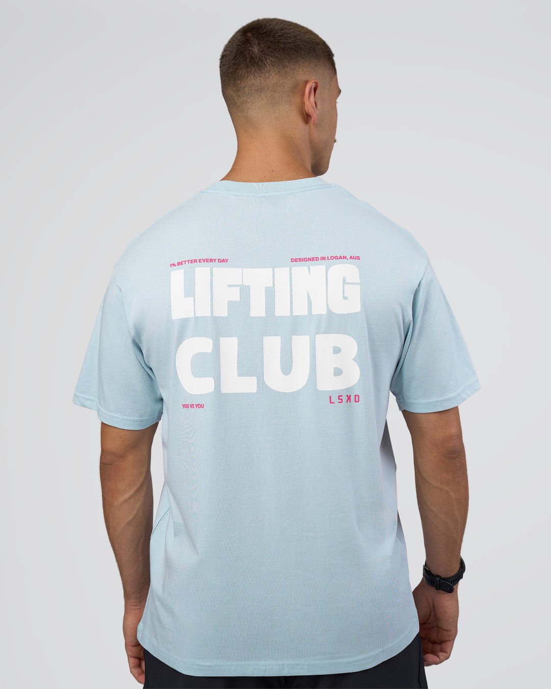Man wearing Lifting FLXCotton Oversized Tee - Blue Aura-Ultra Pink | Model:Nikola | Size:L