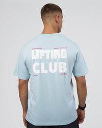 Man wearing Lifting FLXCotton Oversized Tee - Blue Aura-Ultra Pink | Model:Nikola | Size:L