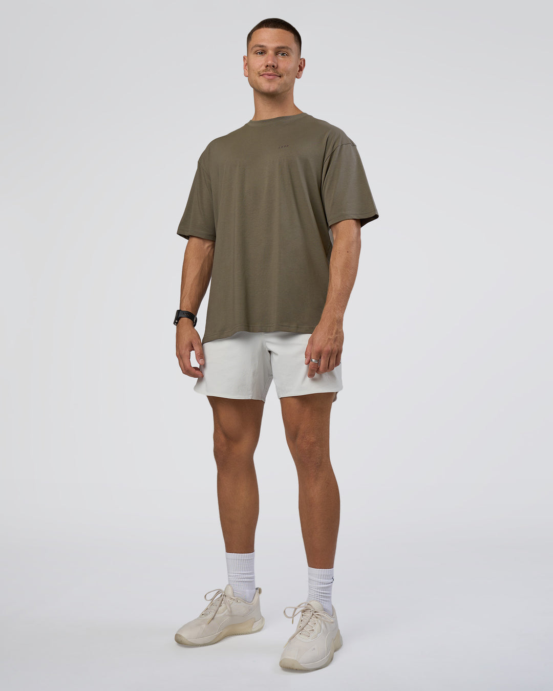 Man wearing Lifting FLXCotton Oversized Tee - Walnut Grey-Hot Chocolate | Model:Nikola | Size:L