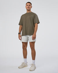 Man wearing Lifting FLXCotton Oversized Tee - Walnut Grey-Hot Chocolate | Model:Nikola | Size:L