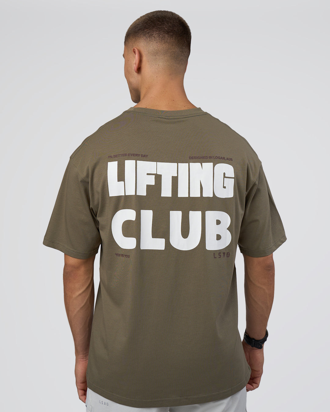 Man wearing Lifting FLXCotton Oversized Tee - Walnut Grey-Hot Chocolate | Model:Nikola | Size:L