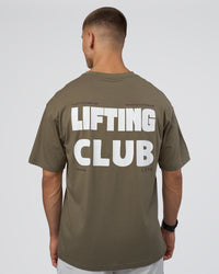 Man wearing Lifting FLXCotton Oversized Tee - Walnut Grey-Hot Chocolate | Model:Nikola | Size:L