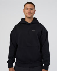 Man wearing Lifting Unisex Oversized Hoodie - Black-Flame| Model:Nikola | Size:L