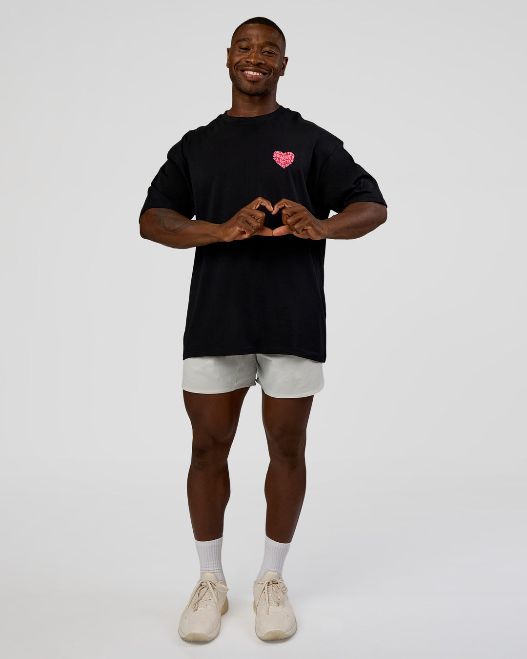Man wearing Love the Journey FLXCotton Oversized Tee - Black-Flame | Model:Sam | Size:L