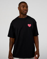 Man wearing Love the Journey FLXCotton Oversized Tee - Black-Flame | Model:Sam | Size:L