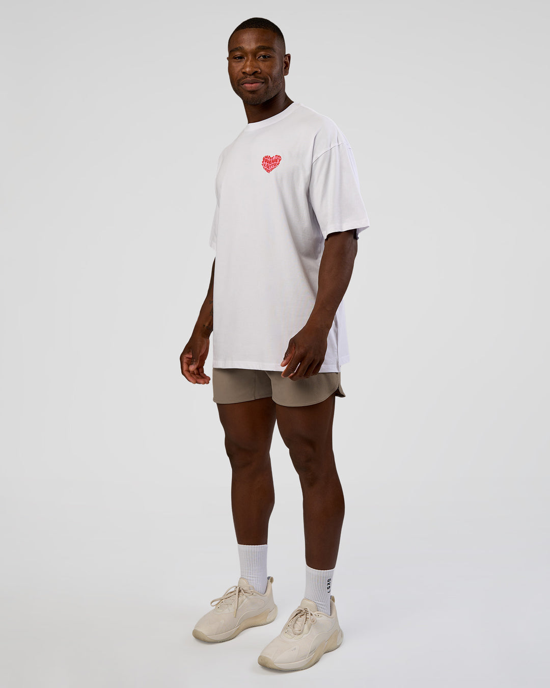 Man wearing Love the Journey FLXCotton Oversized Tee - White-Candy Pink | Model:Sam | Size:L