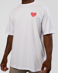 Man wearing Love the Journey FLXCotton Oversized Tee - White-Candy Pink | Model:Sam | Size:L