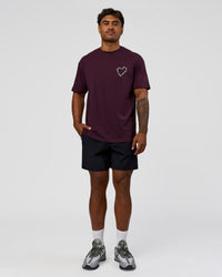 Man wearing Love The Process FLXCotton Oversize Tee - Midnight Plum-White | Model:Xav | Size:L