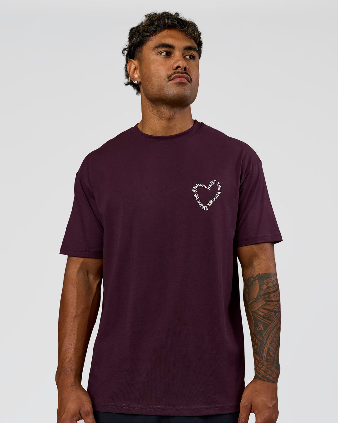 Man wearing Love The Process FLXCotton Oversize Tee - Midnight Plum-White | Model:Xav | Size:L