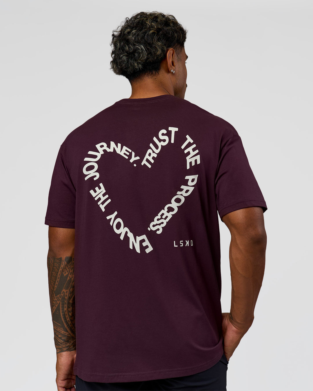 Man wearing Love The Process FLXCotton Oversize Tee - Midnight Plum-White | Model:Xav | Size:L