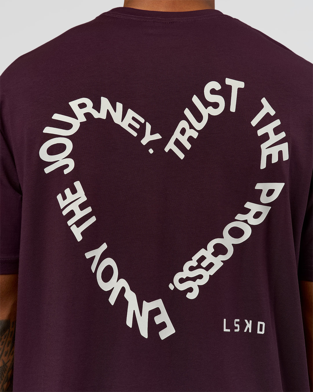 Man wearing Love The Process FLXCotton Oversize Tee - Midnight Plum-White | Model:Xav | Size:L