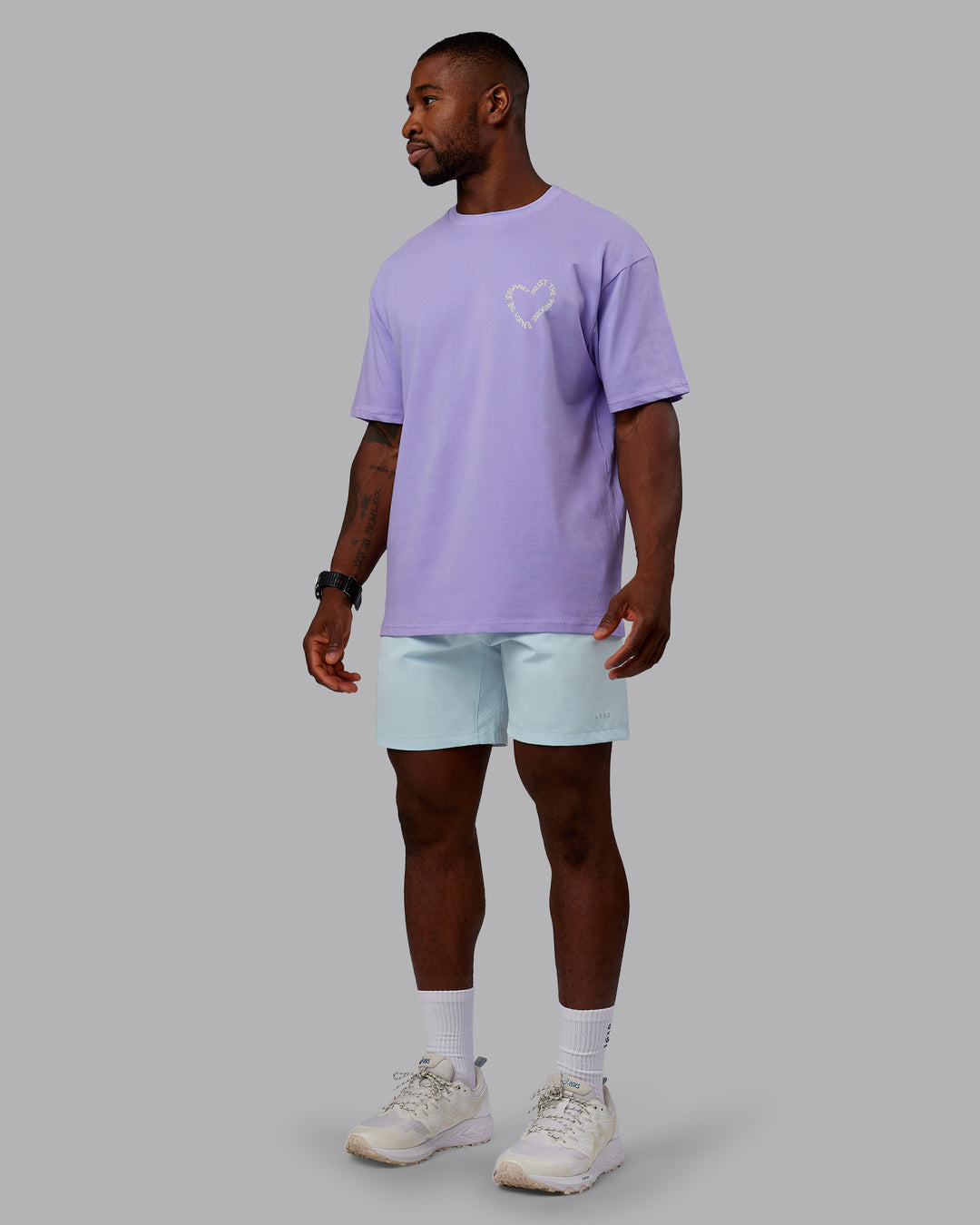 Man wearing Love The Process FLXCotton Oversize Tee - Violet Ray-Bone | Model:Sam | Size:L