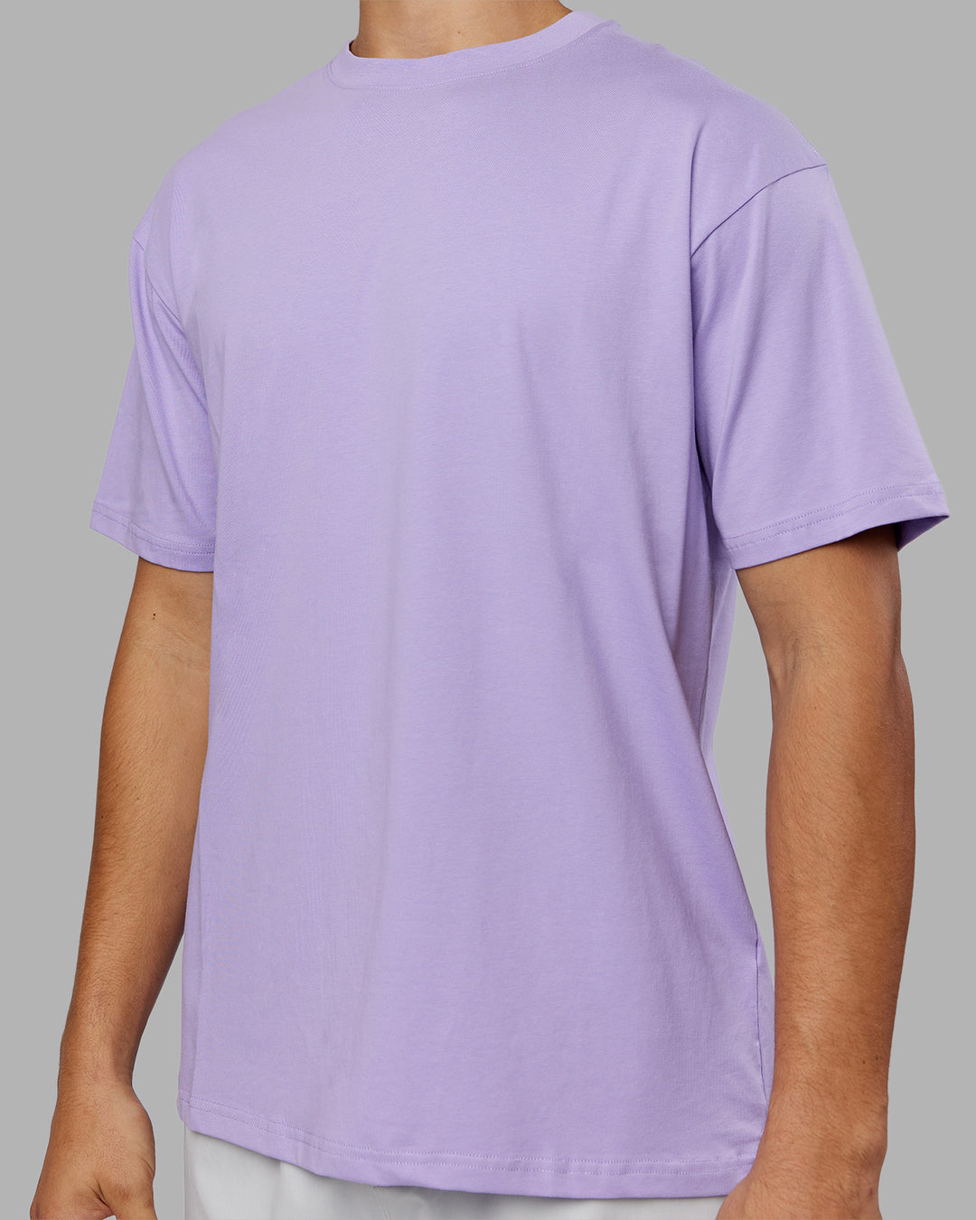 Man wearing Love The Run FLXCotton Tee Oversize - Violet Ray-Royal Purple | Model:Jackson | Size:L